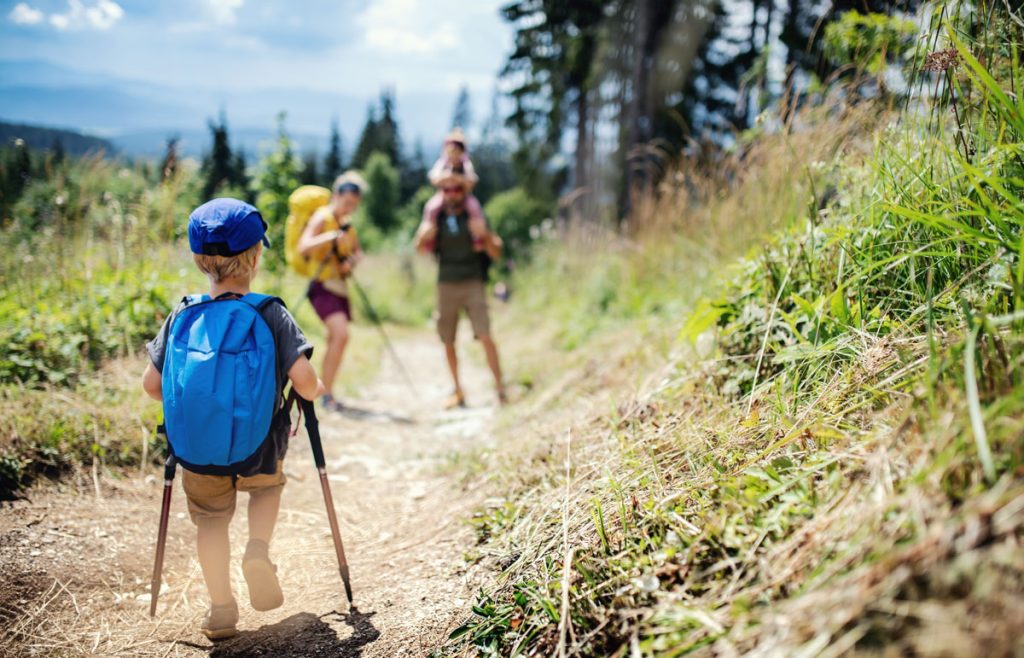 family hiking outdoors