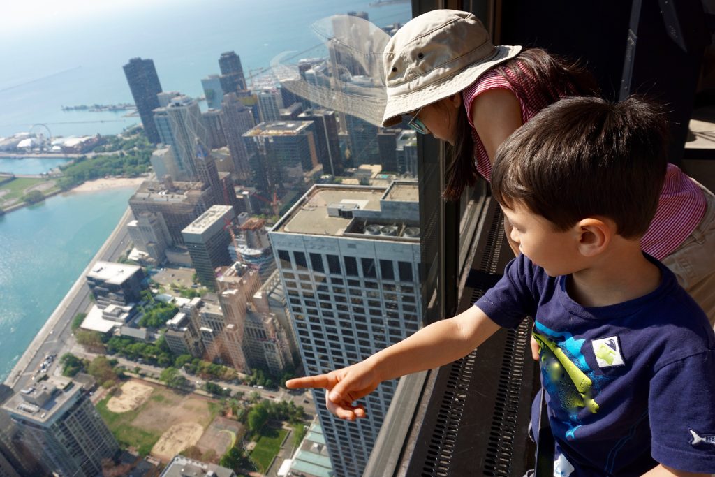 children looking at view of chicago skyscrapers 2021 08 29 23 16 00 utc