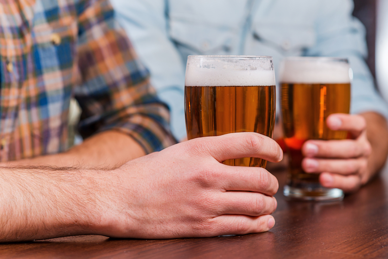 drinking beer at the bar close up of two friends 2022 02 03 07 55 21 utc