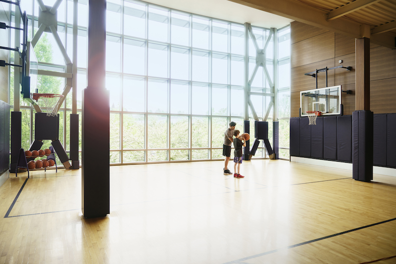 father teaching son basketball shooting 2022 03 04 02 22 48 utc