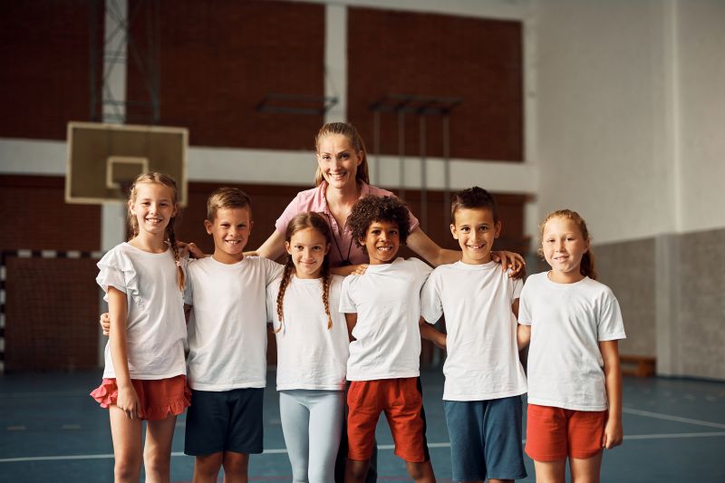 happy teacher and her students