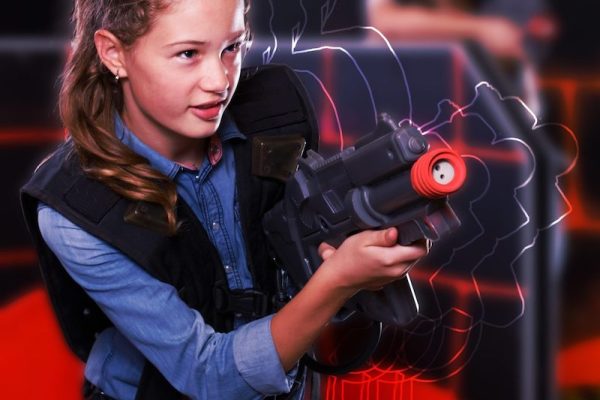 Girl playing laser tag